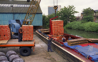 Brentford Dock - loading barge - 1971