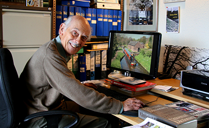 derek at his desk